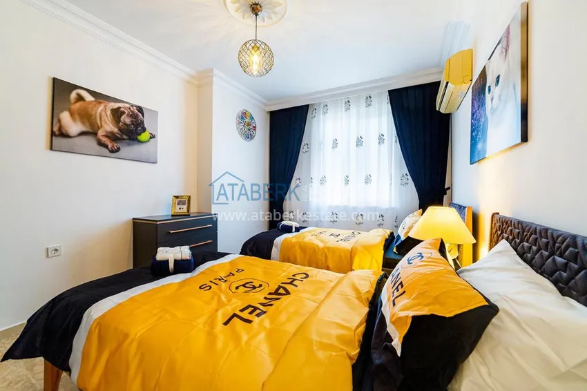 Приобрести Квартира в Махмутларе с ярким интерьером, открытым видом в жилом комплексе 10 