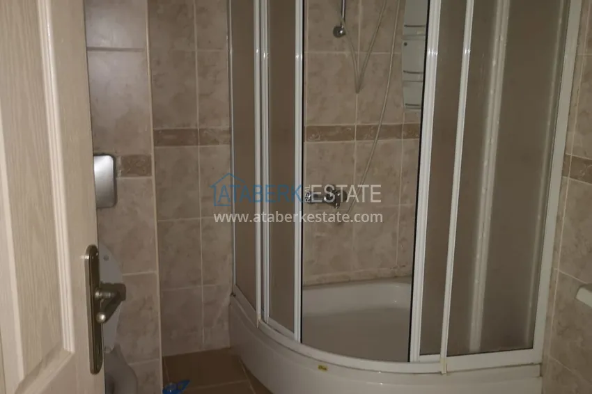 Приобрести Квартира в Махмутларе с частичным видом на море в жилом комплексе 10 