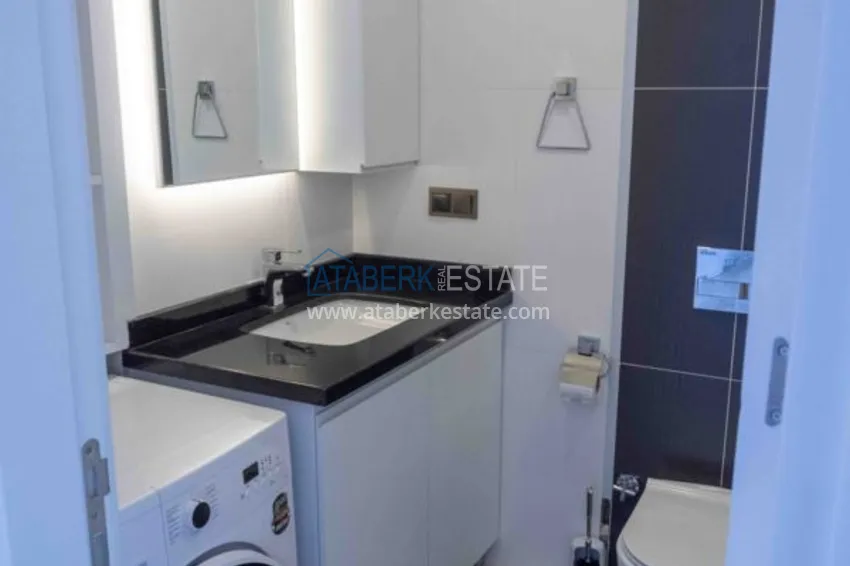 Приобрести Квартира в Махмутларе меблированная с видом на море и горы в комплексе класса люкс 12 