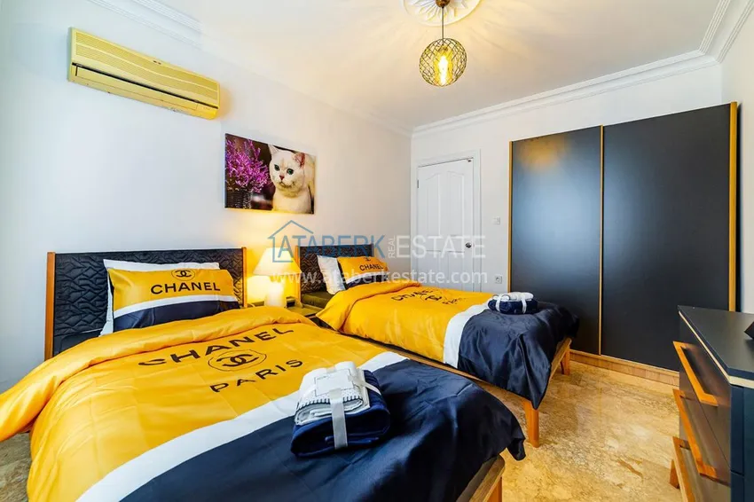 Приобрести Квартира в Махмутларе с ярким интерьером, открытым видом в жилом комплексе 11 