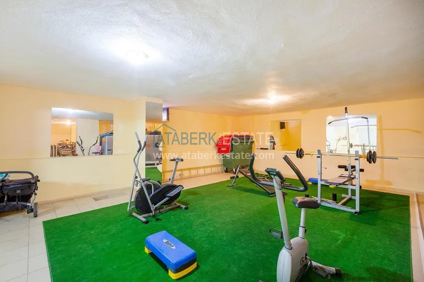 Квартира в Махмутларе с ярким интерьером, открытым видом в жилом комплексе 14 