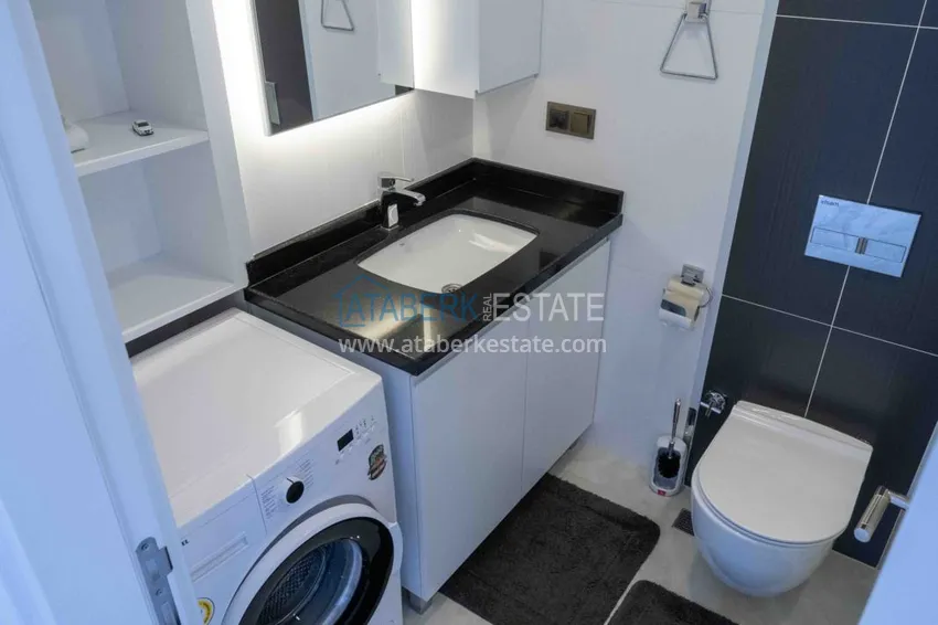 Приобрести Квартира в Махмутларе меблированная с видом на море и горы в комплексе класса люкс 13 