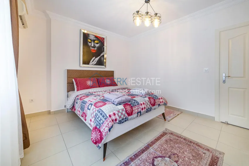 Приобрести  Квартира в Махмутлар в центре с мебелью и видом на море  11 