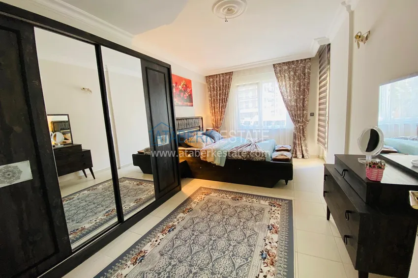 Приобрести Квартира в Махмутларе с мебелью - центр района рядом с морем  12 