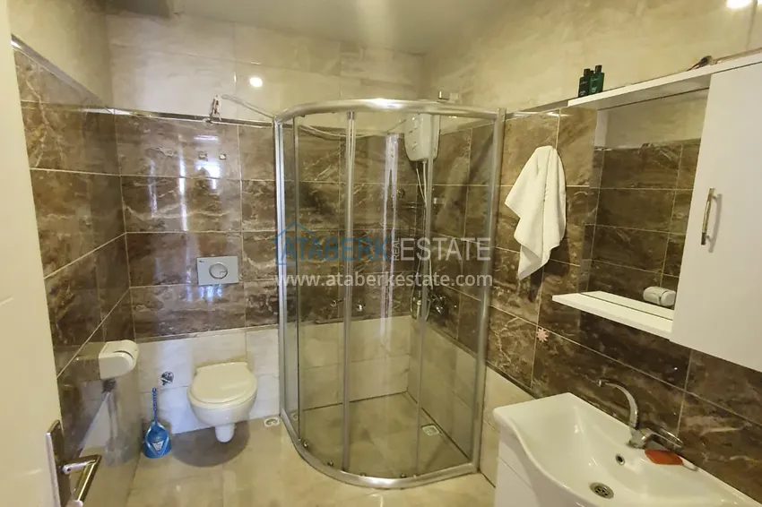 Приобрести Квартира в Махмутларе с мебелью, видом на море и горы в жилом комплексе 11 