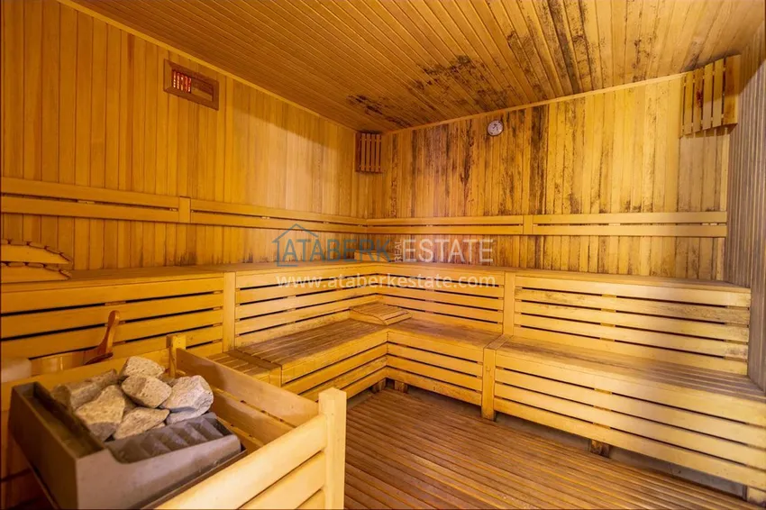 Квартира в Махмутларе с ярким интерьером, открытым видом в жилом комплексе 15 