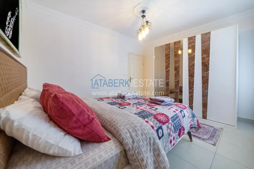 Приобрести  Квартира в Махмутлар в центре с мебелью и видом на море  12 