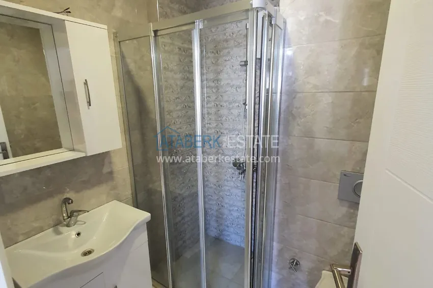 Приобрести Квартира в Махмутларе с мебелью, видом на море и горы в жилом комплексе 12 