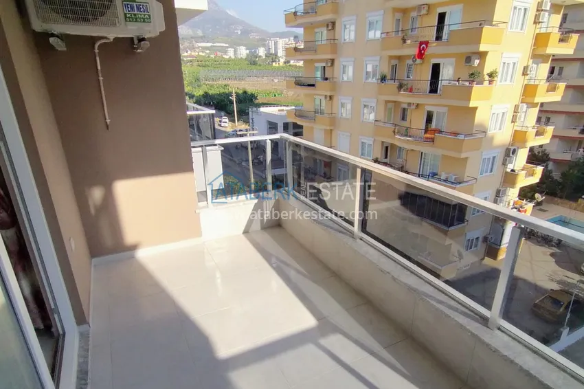 Приобрести Квартира в Махмутларе с новой мебелью в молодом современном комплексе 13 