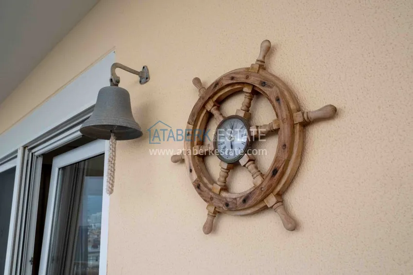 Приобрести Квартира в Махмутларе с мебелью прямым видом на море в комплексе на первой линии 26 