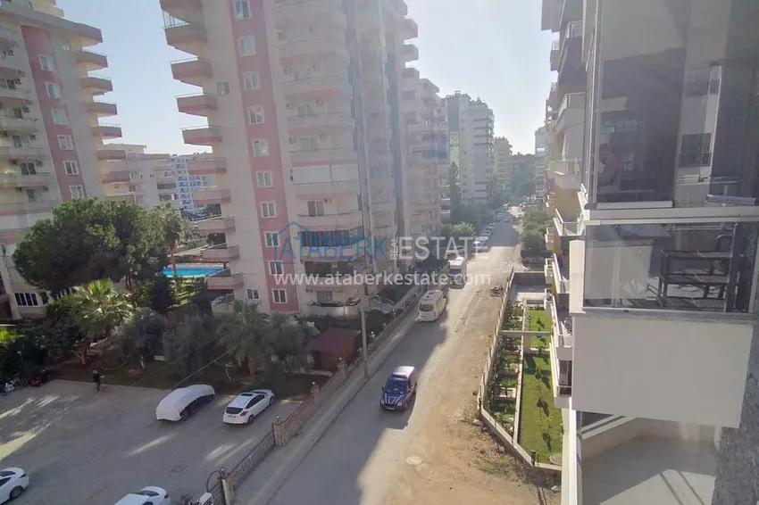 Приобрести Квартира в Махмутларе с новой мебелью в молодом современном комплексе 16 