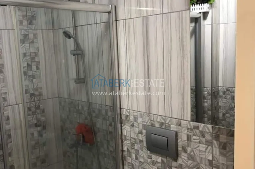 Приобрести Квартира в Махмутларе с мебелью отдельной кухней и видом на море  21 