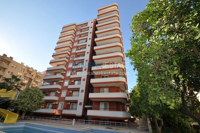 Квартира в Махмутларе с ярким интерьером, открытым видом в жилом комплексе 5 