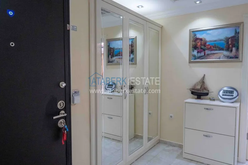 Приобрести Квартира в Махмутларе с мебелью прямым видом на море в комплексе на первой линии 1 