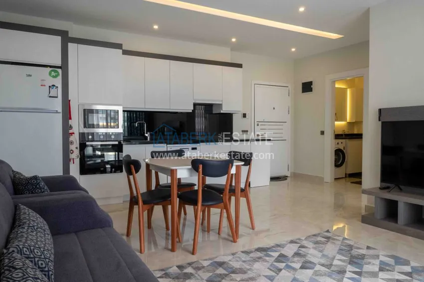 Приобрести Квартира в Махмутларе меблированная с видом на море и горы в комплексе класса люкс 2 