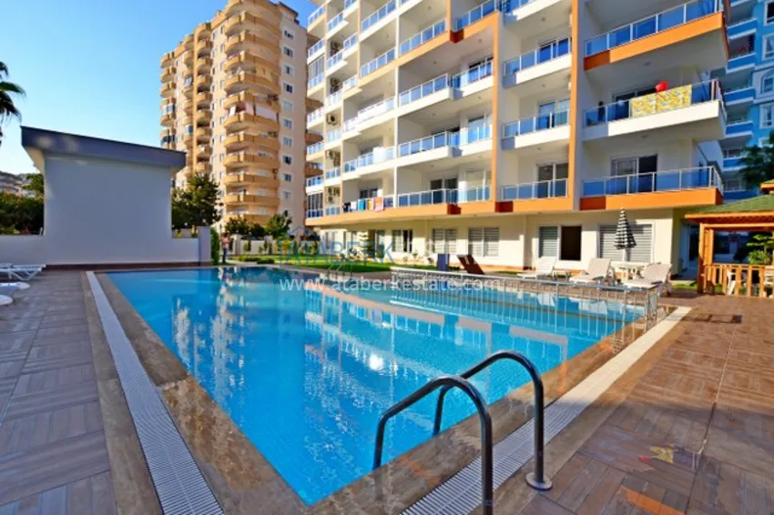 Квартира в Махмутларе меблированная, двухкомнатная с открытым видом 2