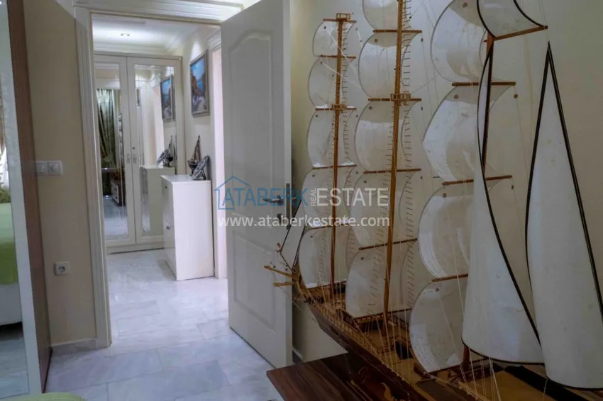 Приобрести Квартира в Махмутларе с мебелью прямым видом на море в комплексе на первой линии 41 