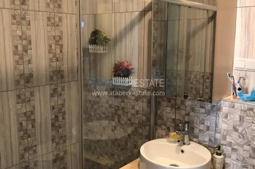 Приобрести Квартира в Махмутларе с мебелью отдельной кухней и видом на море  22 