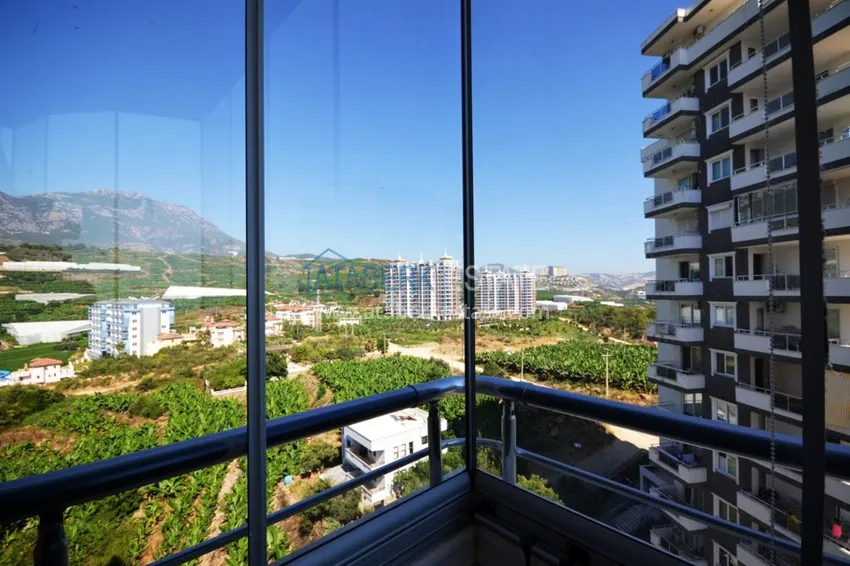 Приобрести Квартира в Махмутларе с мебелью и открытым видом на море и горы 25 