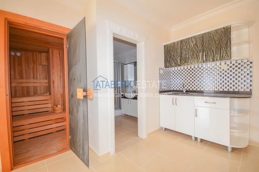 Приобрести Пентхаус в Махмутларе двухуровневый с четырьмя спальнями и личной сауной  23 