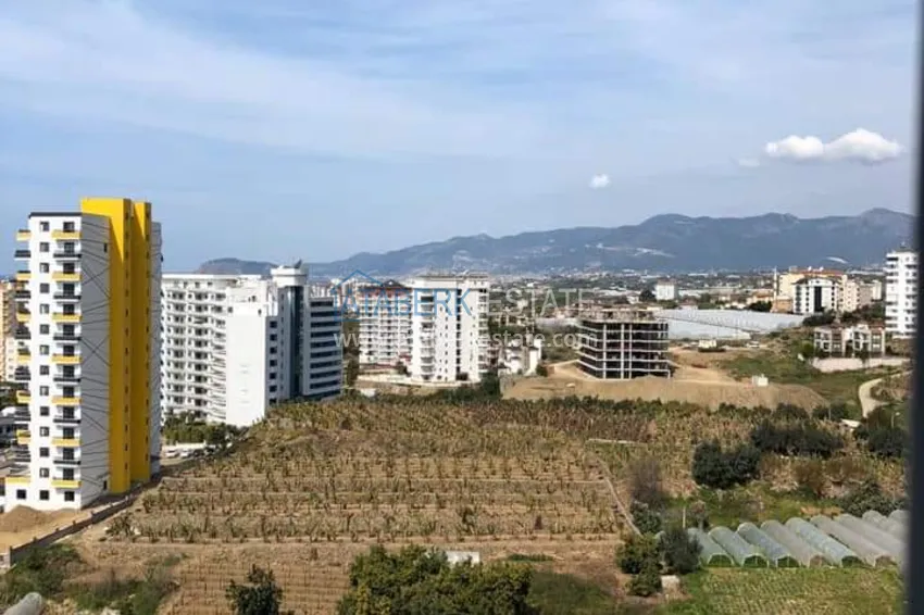 Приобрести Квартира в Махмутларе с мебелью отдельной кухней и видом на море  25 