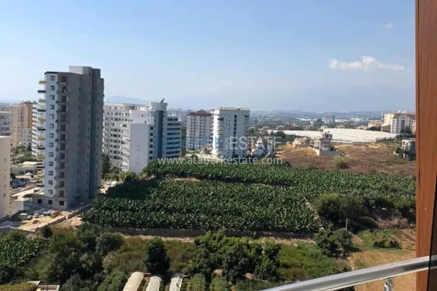 Приобрести Квартира в Махмутларе с мебелью отдельной кухней и видом на море  27 