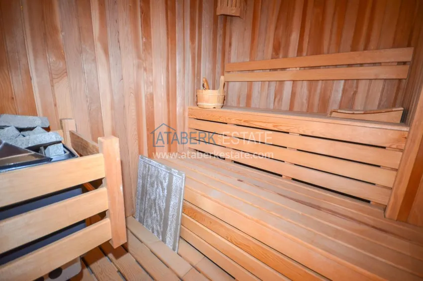 Приобрести Пентхаус в Махмутларе двухуровневый с четырьмя спальнями и личной сауной  25 