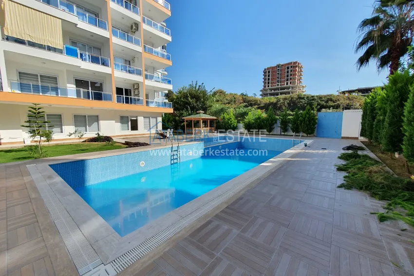 Квартира в Махмутларе меблированная, двухкомнатная с открытым видом 4