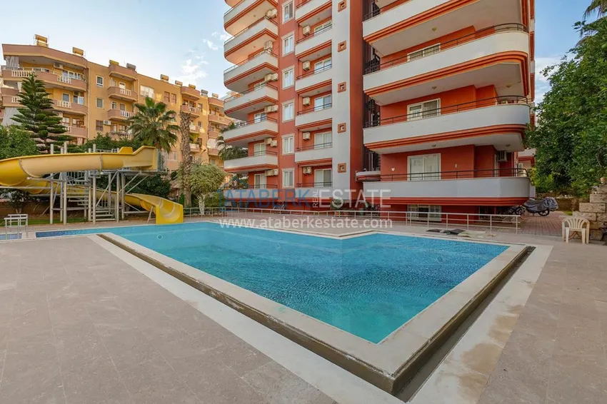 Квартира в Махмутларе с ярким интерьером, открытым видом в жилом комплексе 6 