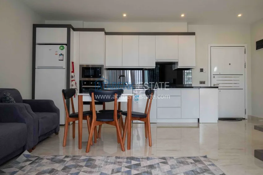 Приобрести Квартира в Махмутларе меблированная с видом на море и горы в комплексе класса люкс 3 