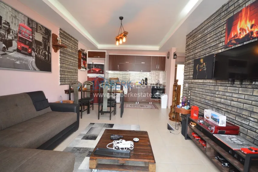 Приобрести Квартира в Махмутларе со стильным интерьером в жилом комплексе 2 