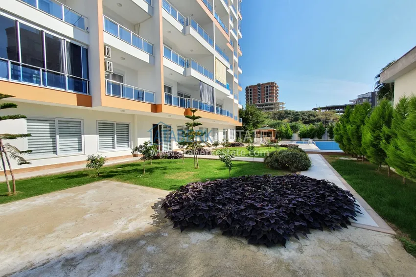 Квартира в Махмутларе меблированная, двухкомнатная с открытым видом 8