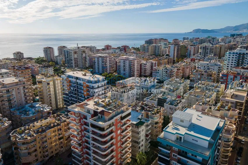 Квартира в Махмутларе с ярким интерьером, открытым видом в жилом комплексе 4 