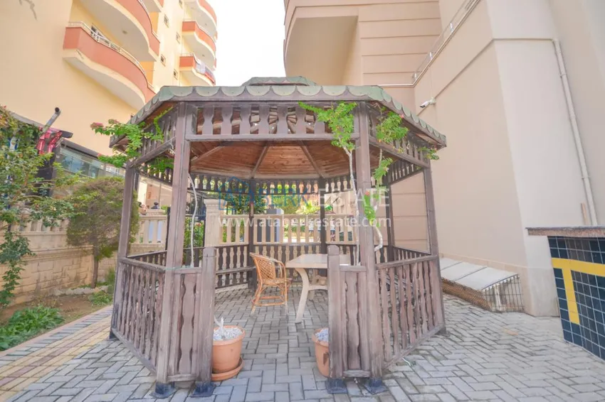 Квартира в Махмутларе с мебелью, застекленным балконом на центральной улице  5 