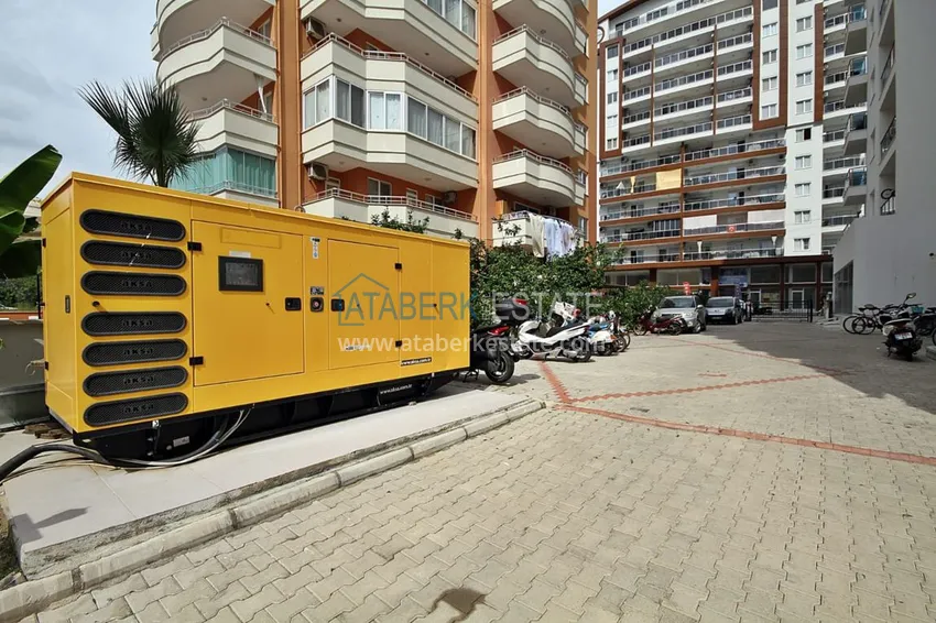 Квартира в Махмутларе в современном жилом комплексе  12 