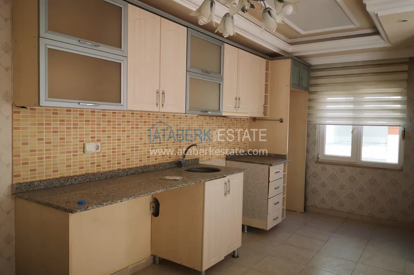 Приобрести Квартира в Махмутларе с частичным видом на море в жилом комплексе 5 