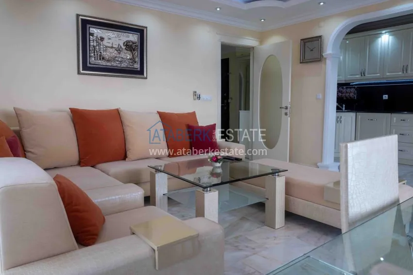 Приобрести Квартира в Махмутларе с мебелью прямым видом на море в комплексе на первой линии 10 