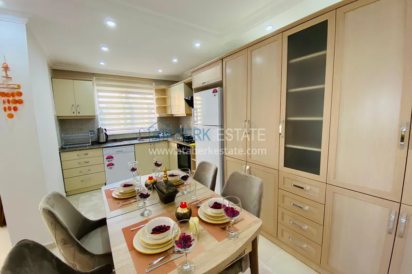 Приобрести Квартира в Махмутларе с мебелью - центр района рядом с морем  7 