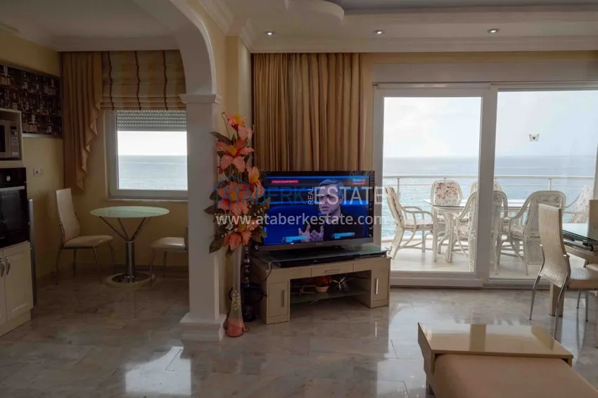 Приобрести Квартира в Махмутларе с мебелью прямым видом на море в комплексе на первой линии 12 