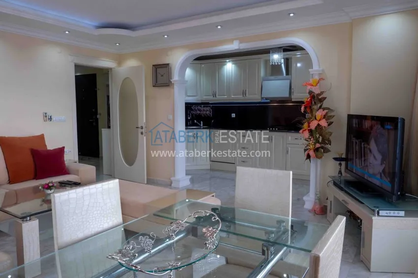 Приобрести Квартира в Махмутларе с мебелью прямым видом на море в комплексе на первой линии 13 