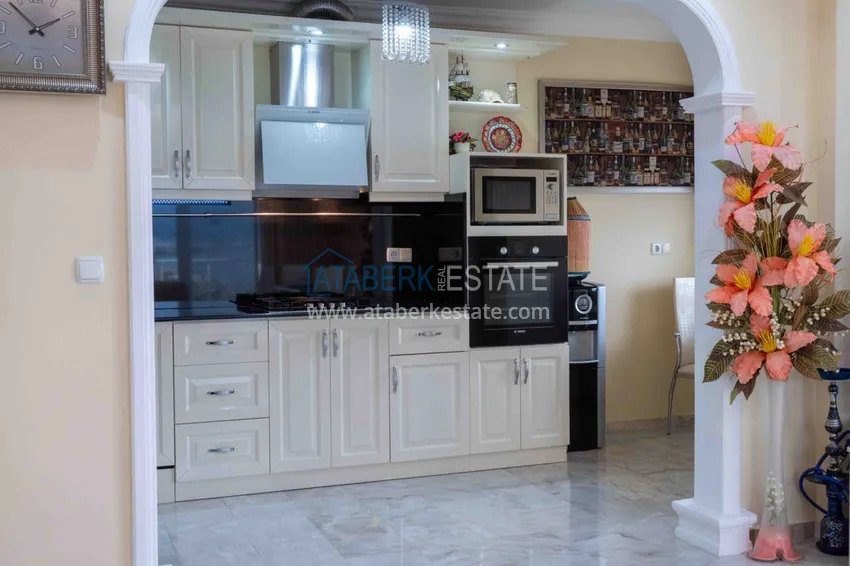 Приобрести Квартира в Махмутларе с мебелью прямым видом на море в комплексе на первой линии 14 