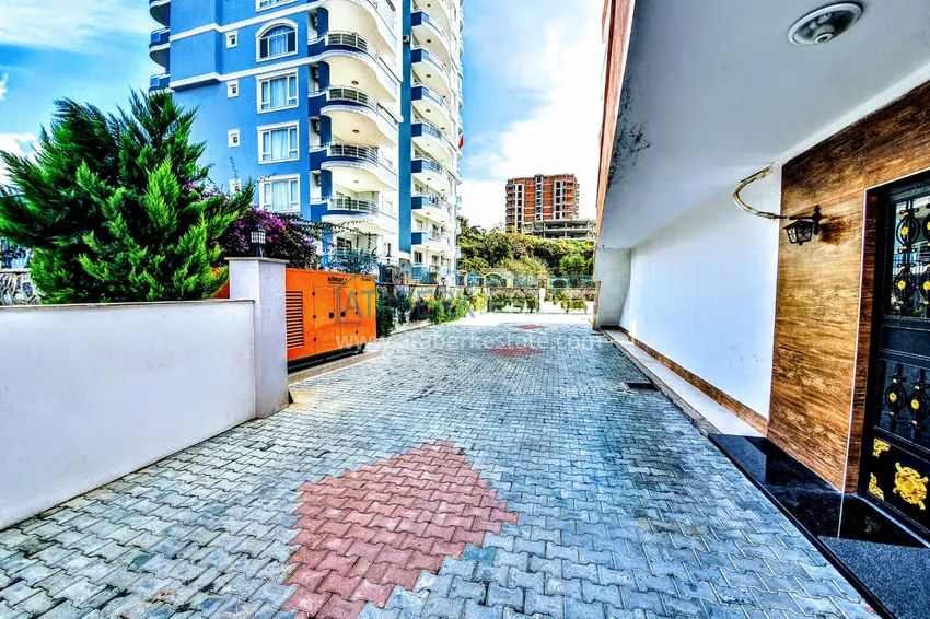 Квартира в Махмутларе меблированная, двухкомнатная с открытым видом 16