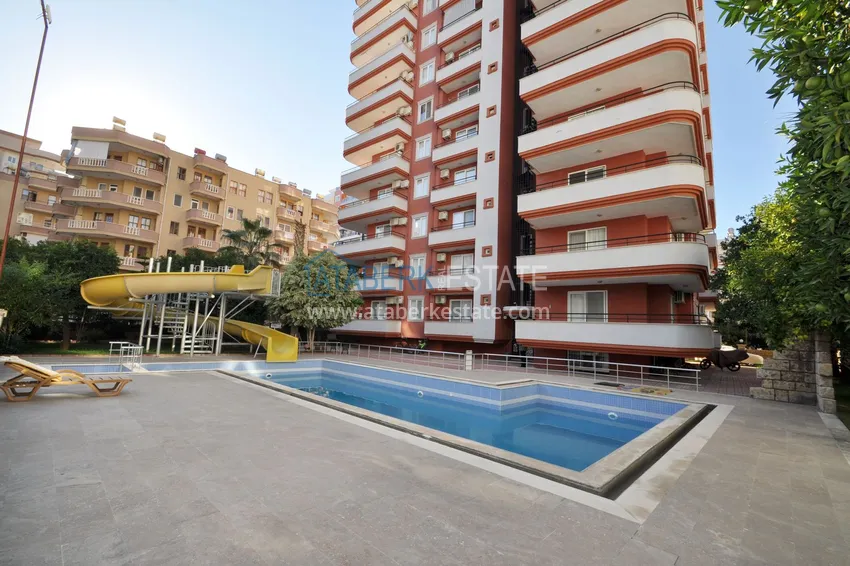 Квартира в Махмутларе с ярким интерьером, открытым видом в жилом комплексе 11 