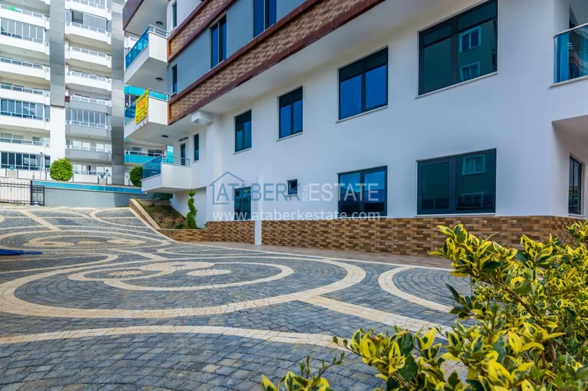 Квартира в Махмутларе с мебелью в современном жилом комплексе 10 