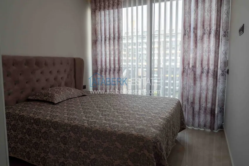 Приобрести Квартира в Махмутларе меблированная с видом на море и горы в комплексе класса люкс 9 