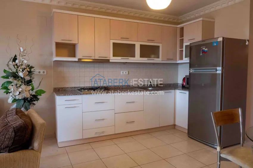 Приобрести Квартира в Авсалларе с мебелью видом на море в таунхаусе 7 