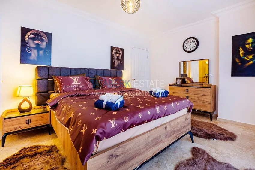 Приобрести Квартира в Махмутларе с ярким интерьером, открытым видом в жилом комплексе 9 