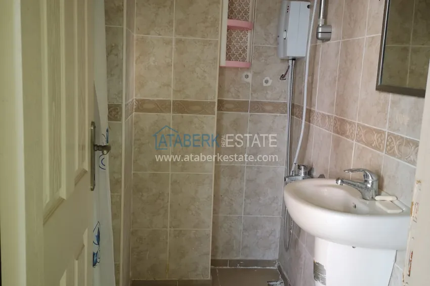 Приобрести Квартира в Махмутларе с частичным видом на море в жилом комплексе 9 