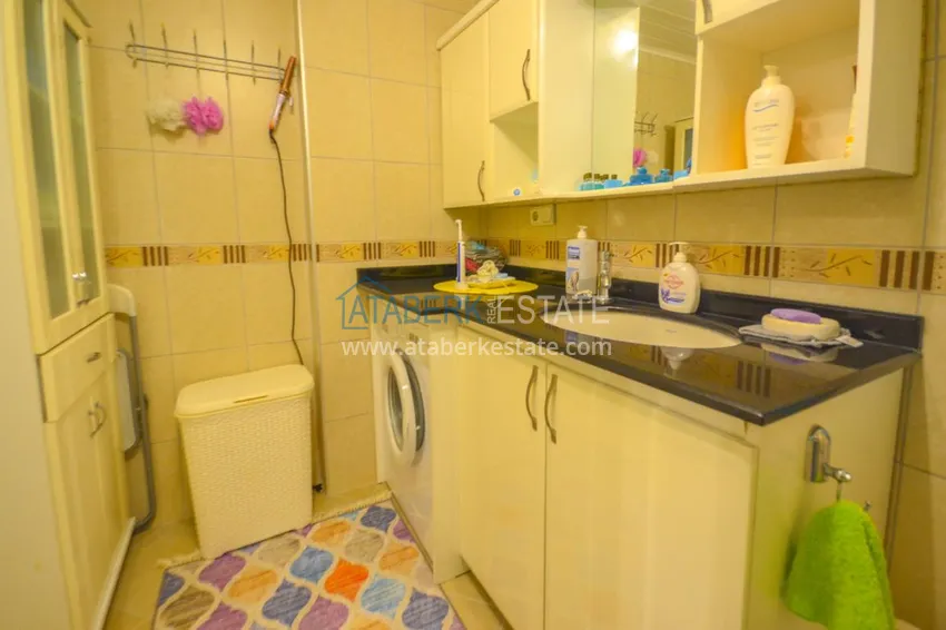 Приобрести Квартира в Махмутларе с мебелью, застекленным балконом на центральной улице  23 