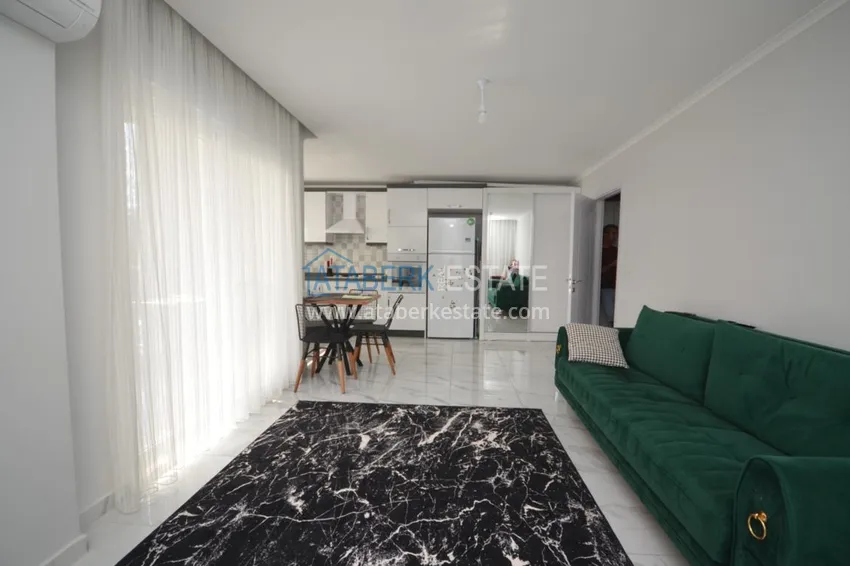 Приобрести Квартира в Махмутларе с мебелью в молодом комплексе рядом с морем 1 